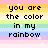 Pixelated text on a rainbow striped background with scattered white sparkles.
