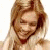 A split-frame contact sheet showing a pixelated image of a smiling woman with long blonde hair on the left and green text reading "Original Icons .com" on a dark green background on the right.