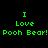 Green pixelated text "I Love Pooh Bear!" displayed across four distinct background color variations in a