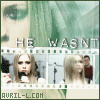 identical frames showing a person with long blonde hair holding a microphone against a green backdrop, with text overlays reading "HE WASNT" and "AVRIL-L.COM"