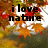 Pixelated image with black text "i love nature" over autumn leaves and a white background.
