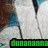 A pixelated image of a person in white clothing with green and blue text overlays changing across frames.