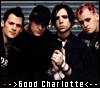Group of people in black clothing with red hair accents, hands clasped together under text reading "-->>Good Charlotte<<--".