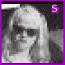 A grayscale image of a person with long hair and sunglasses, framed by a purple border with changing symbols and text.