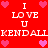 Red background with repeated white text "I LOVE U" and "KENDALLKENDALL", surrounded by pink heart icons in various positions.