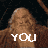 Animated sequence of a bearded figure in brown robes holding a staff, with text overlays changing across frames.