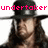 Pixelated image of a person wearing a black wide-brimmed hat with long dark hair, overlaid with pink pixelated text reading 'undertaker'.