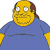 Pixelated character with yellow skin, brown hair, and blue shirt with yellow accents, smiling with wide eyes.