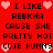 Red background with black pixelated text repeating 'I LIKE REBKHA CAUSE SHE PRETTY HOT CUTE FUNNY' and pink/white heart symbols.