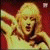 A blonde woman with shoulder-length hair appears in a of 16 showing sequential facial expressions and head movements against a solid red background