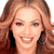 Four 50x50 pixel frames of a celebrity's face arranged in a contact sheet with varying expressions and hair styles, displayed on a gray background.