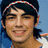 A pixelated image shows a person with dark hair wearing a striped headband, next to a blue background with text reading "joe jonas <3" in black pixelated font.