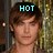 A person with brown hair and blue eyes appears in three , each displaying the word 'HOT' above their head against a golden background