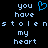 Pixelated text reads 'you have stolen my heart' with a blue heart symbol replacing 'stolen' on the left side, displayed on a black background.