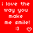 Red background with white pixelated text reading 'i love the way you make me smile!' and two icons: a smiling face ':]' and a heart symbol.