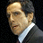 A 48x48 pixel buddy icon featuring a split composition with a person in formal attire on the left and red text reading "Along Came Polly" on the right against a white background.