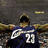 A basketball player in a blue jersey with 'James' and number 23 on the back, viewed from behind with arms outstretched.