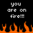 Pixelated text reads 'you are on fire!!!' above orange flames against a black background.