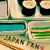 Pixelated of four distinct buddy icons featuring sushi, Japanese text, and a red-and-green design with stylized text