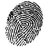 A grayscale pixelated circular shape with varying shades of black, white, and gray forming an abstract pattern.