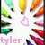 Colorful pencil icons radiate from a central white circle with a pink heart, while the name 'tyler' appears in light purple text below.