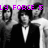 Black-and-white pixelated image of three people in formal attire with purple text overlay reading 'LY FORCE 5' partially visible.