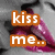 A static image shows a close-up of lips with purple lipstick and text overlays reading 'kiss me..' on the left and 'im brOwn.' on the right.