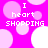 A bright pink background with light pink circles and white text reading "I heart SHOPPING" in pixelated font, with some text and circle elements partially obscured.