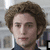 six pixelated images showing a person with curly brown hair in a room with white shelves, each with distinct text overlays
