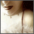 pixelated images showing a person's lower face and neck with text overlays that animate between 'LOVE', 'IS ONLY', and 'TEMPORARY' in varying colors