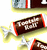 Animated sequence of Hershey's Kisses candies with brown wrappers and red accents, arranged on a white background.