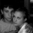 Black-and-white pixelated image of two people embracing, with text "just you" and "and me" on black background