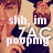 Pixelated image of a person with brown hair and a dark top, overlaid with white text reading 'shh, im pooping' against a light background.