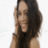 A pixelated image shows a person with long dark hair on the left, and light blue text reading "*Say Che" on the right against a white background.