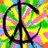 Pixelated peace sign with vibrant tie-dye background and purple text reading GROOVY BABY.