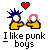 Pixel art of two figures in yellow shirts holding hands under a red heart, with text reading "I like punk boys" below.