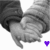 A grayscale image of two hands clasped together with a small colored heart icon below, showing animation changes in the heart's color.