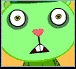 Animated green cartoon character with large eyes, pink heart nose, and open mouth showing teeth on orange background; text "Happy" appears in light brown script on green square.