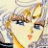 Pixelated anime-style character with blonde hair and blue eyes, next to black background with white text reading 'AnimeIM' and 'com'.