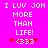 Pixelated text on bright pink background with red and white symbols below.
