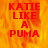 Red text reading "KATIE LIKE A PUMA" on a pixelated orange-yellow flame background with a gray rectangle in the bottom right corner.