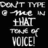 Pixelated grayscale text reads 'DON'T TYPE THE WHAT TOOK OF VOICE' on a black background with no visible motion or additional elements.