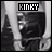 A black-and-white animated contact sheet of a person's lower body with hands bound behind their back, showing slight hand and arm position changes across frames.