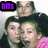 Pixelated image shows three people with dark hair in close proximity, one wearing pink clothing and a purple text box reading 'blts' on black background.