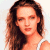 A pixelated image of a woman with long brown hair wearing a white top, next to green text reading 'Original Icons .com' on a dark background.