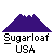 Pixelated mountain icon with white peak and purple base, below which black text reads 'Sugarloaf USA' on gray background.