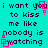 Cyan background with dark purple text repeating 'i want you i want you to kiss me like nobody is watching' and pink square outlines moving across the image.
