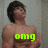 A shirtless man with dark hair stands against a light gray background, with green text appearing sequentially over his chest.