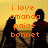 Pixelated orange text overlays silhouettes of four figures against a yellow background with a horizontal brown line.