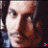 A 3x3 contact sheet of animated frames showing a person's face with subtle expression changes and small pink heart icons in the corners, displayed on a gray background.
